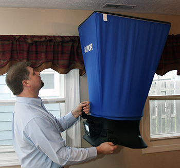 Airflow testing using a balancing hood