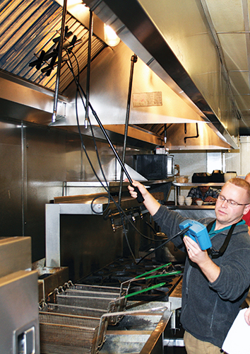 Using a TSI/Alnor Velocity Matrix on a kitchen hood.