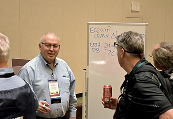 During High-Performance HVAC Summit 2022, Rob does what he loves -- explaining airflow to contractor attendees during the Performance Town session.