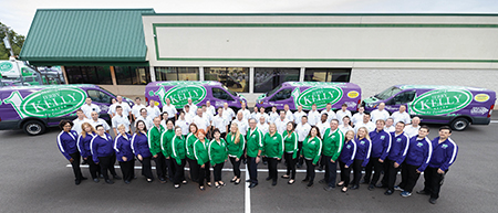 The Jerry Kelly team in front of the newer headquarters building.