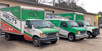 Worley's trucks show off their colorful orange and green branding