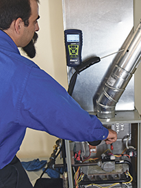 Casey Contreras demonstrates conducting draft pressure tests.