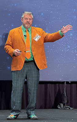 Everyone recognizes Chuck Worley's brand -- he wears his orange and green clothing everywhere.